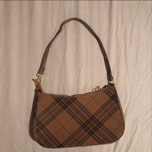 Cute brown shoulder bag. Never been used.